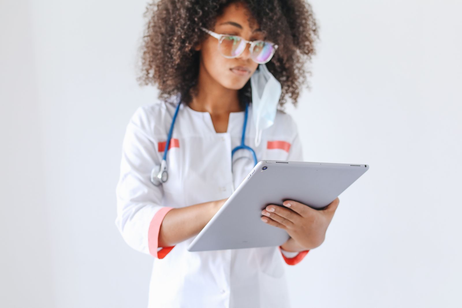 Healthcare professional using a digital tablet