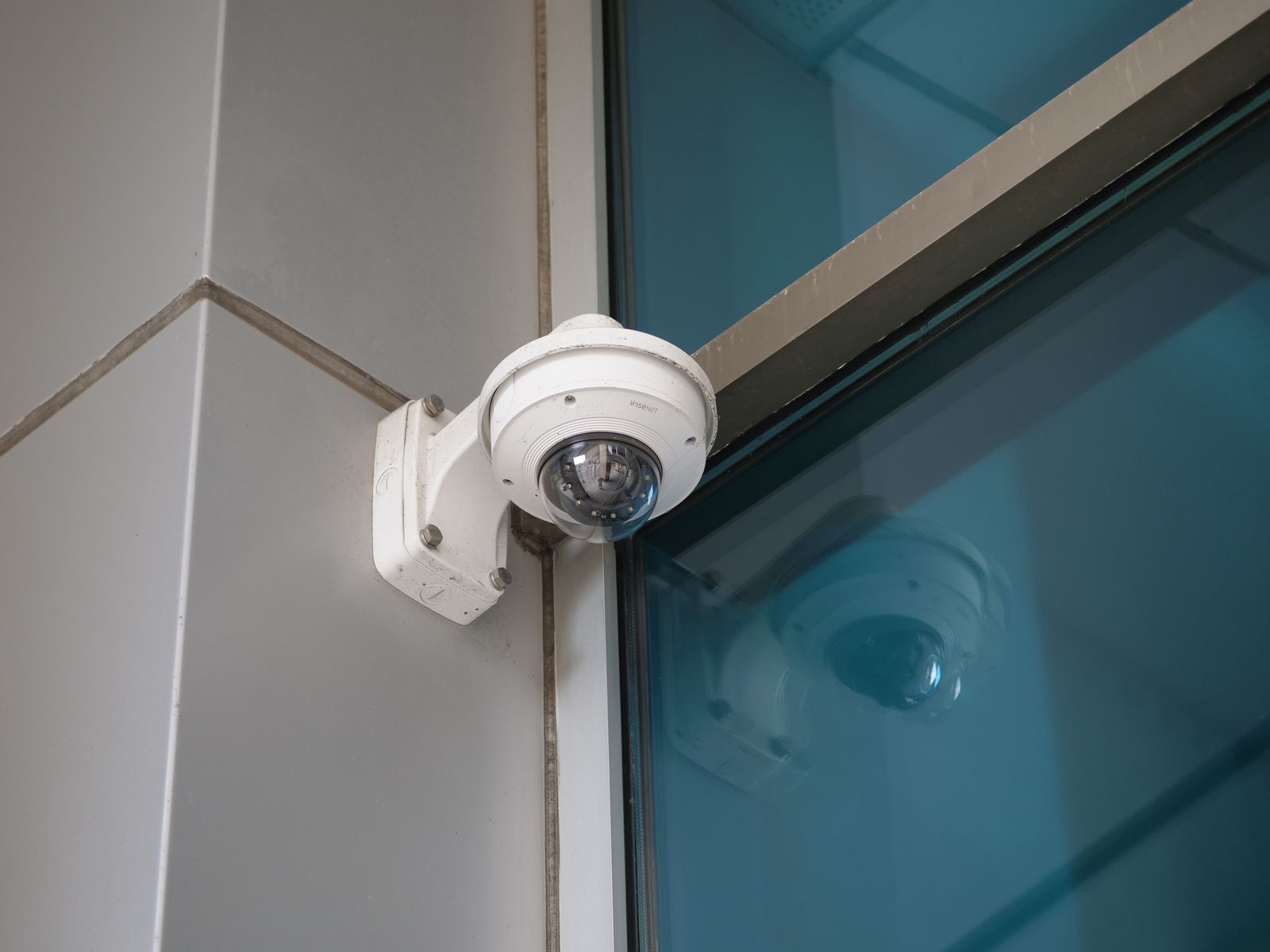 Professional security camera installed on a modern building