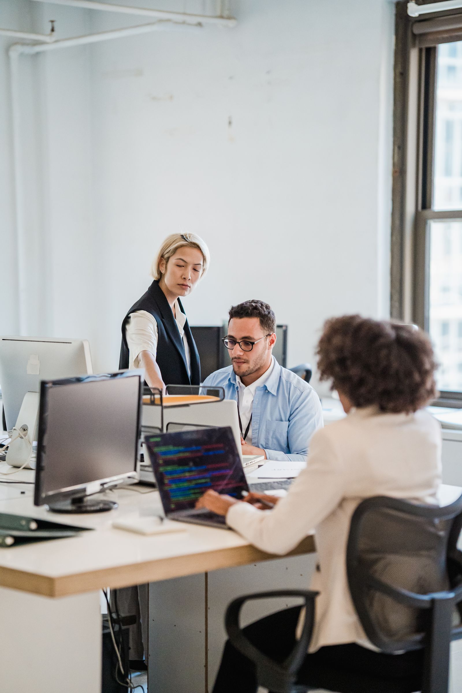 Technology team collaborating in an office