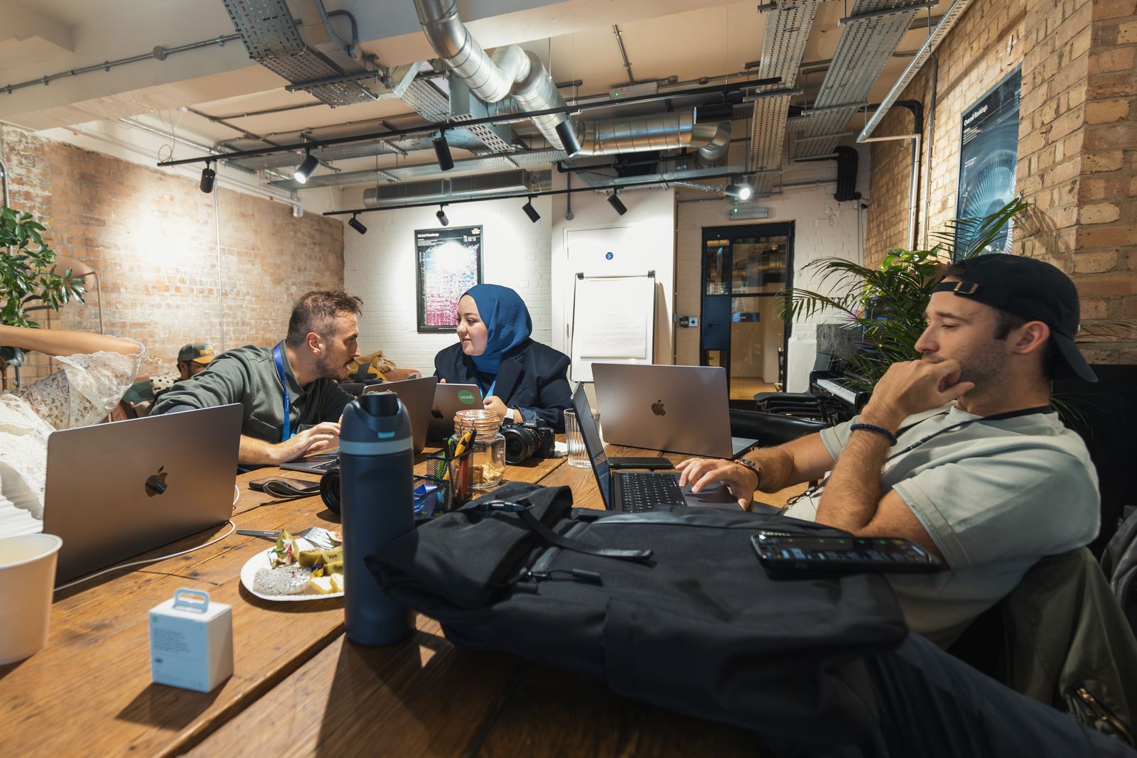 Technology team collaborating in a modern workplace
